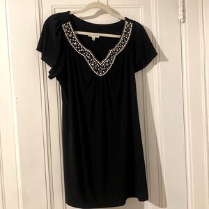 Black women’s top. Size large Long in length.